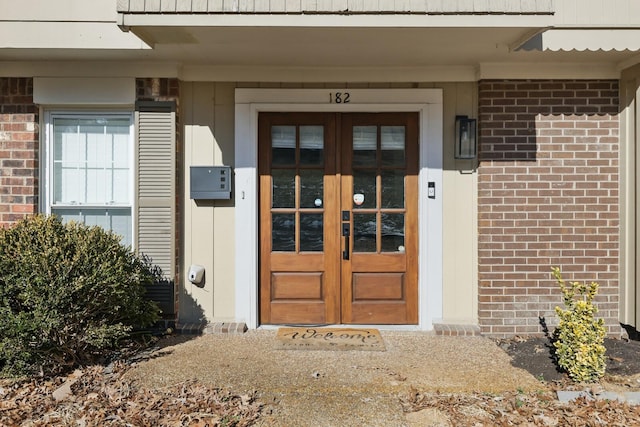 property entrance featuring french doors