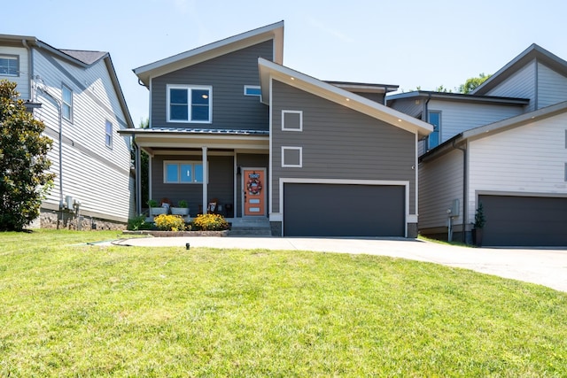 view of front facade featuring a garage, a porch, and a front lawn