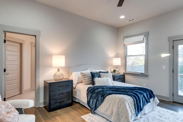 bedroom with visible vents, a ceiling fan, wood finished floors, access to outside, and recessed lighting