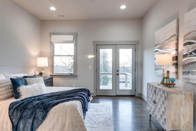 bedroom featuring access to exterior, multiple windows, visible vents, and french doors