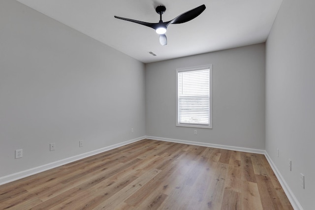 empty room featuring light hardwood / wood-style floors