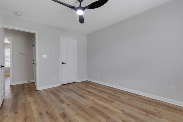 unfurnished bedroom featuring ceiling fan and light hardwood / wood-style flooring