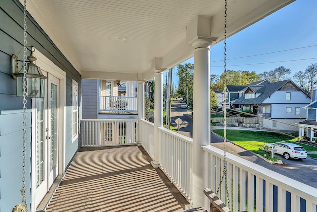 balcony featuring covered porch