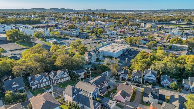 birds eye view of property featuring a mountain view