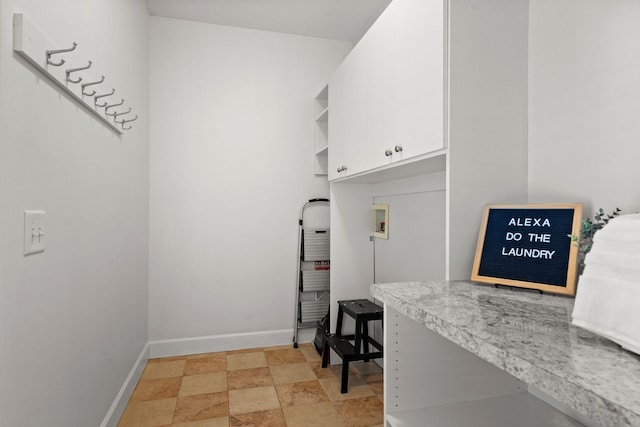 laundry room with cabinets