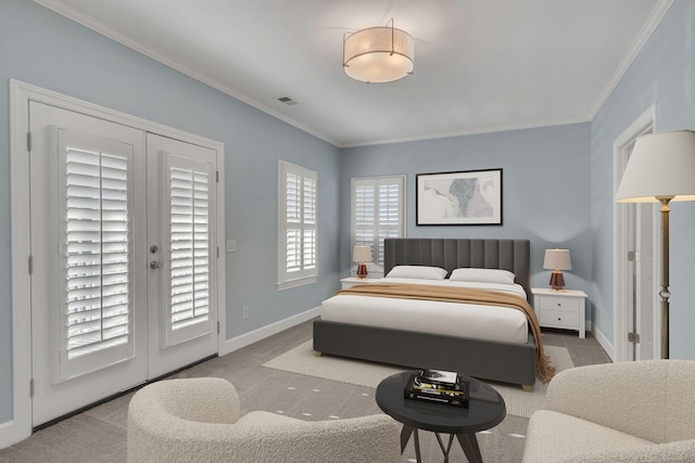 bedroom featuring ornamental molding and carpet