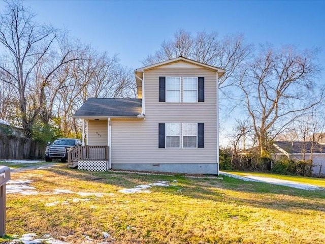 front facade with a front yard