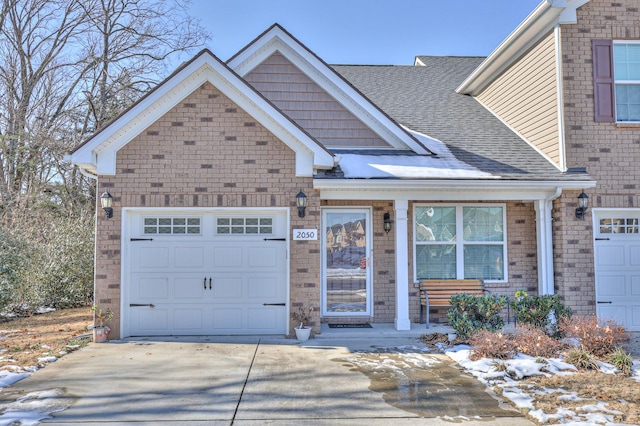 view of front of property with a garage