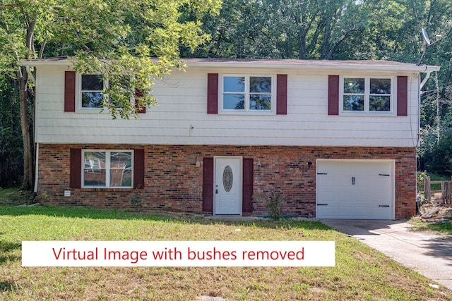 view of front facade featuring a garage and a front lawn