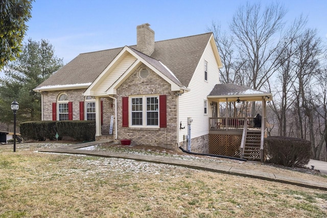 view of front of home with a front lawn and a porch