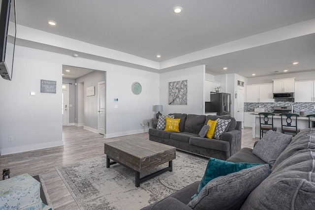 living room featuring light hardwood / wood-style floors