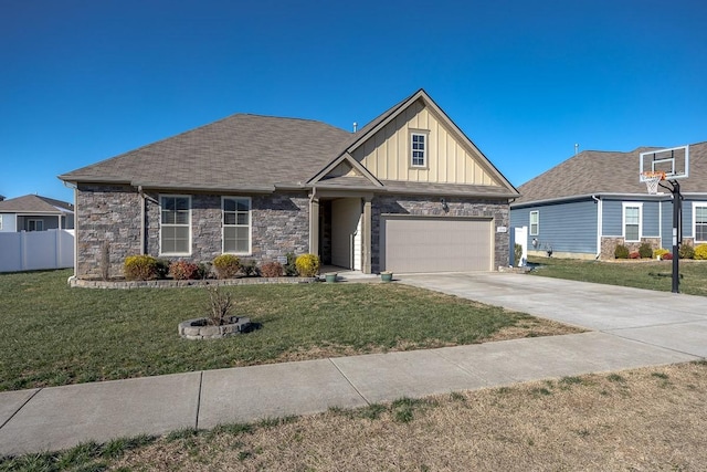 view of front of home featuring a front lawn and a garage