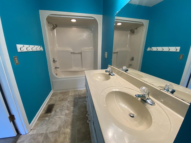 bathroom with shower / bath combination and vanity