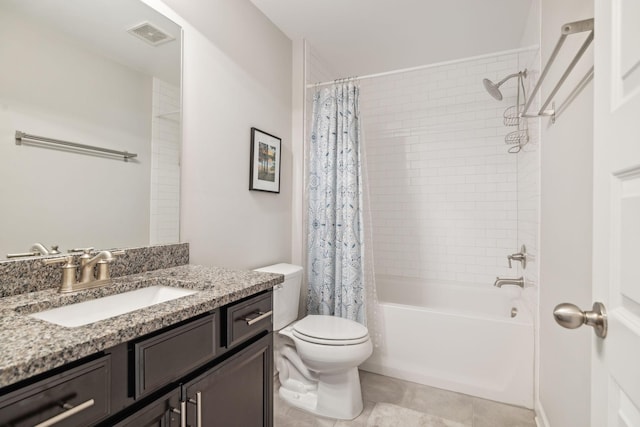 full bathroom featuring toilet, vanity, and shower / tub combo