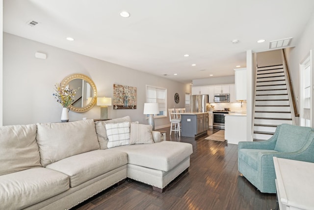 living room with dark wood-type flooring