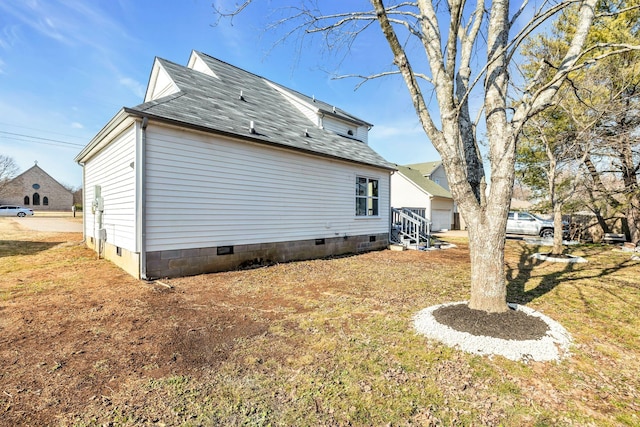 view of property exterior with a lawn