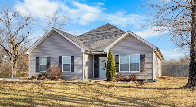 view of front of home with a front lawn