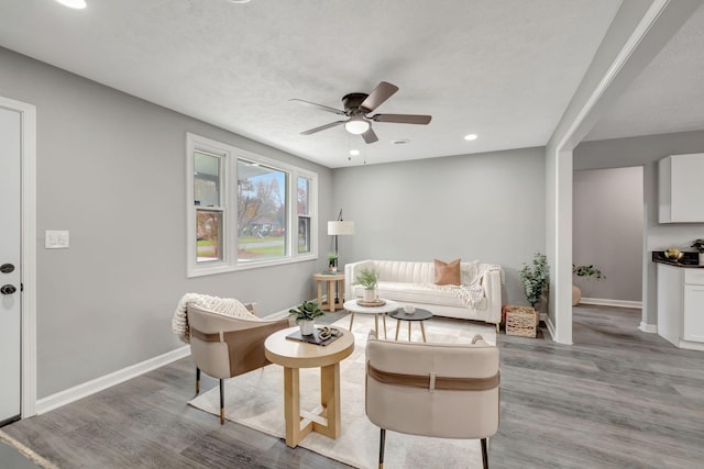 interior space featuring ceiling fan and wood-type flooring