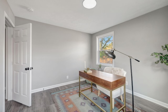 office area with dark wood-type flooring