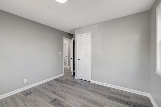 spare room with light hardwood / wood-style floors