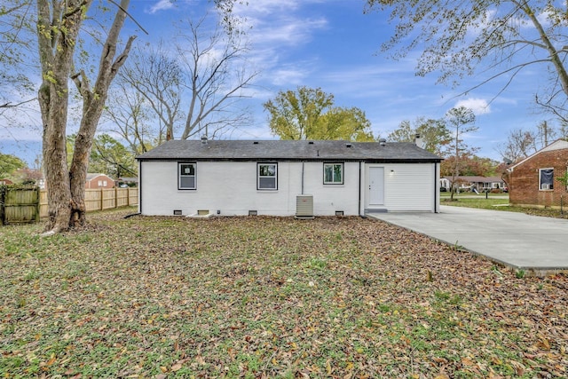 back of house with central AC and a patio