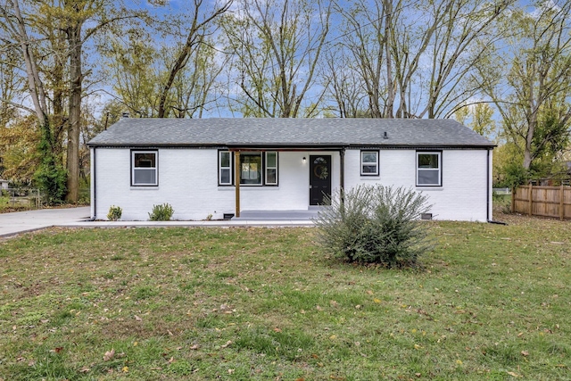 ranch-style house with a front yard and a porch