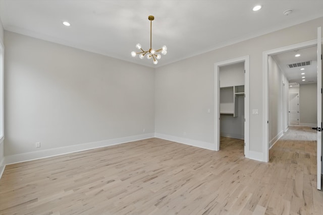 interior space with visible vents, baseboards, an inviting chandelier, and light wood finished floors