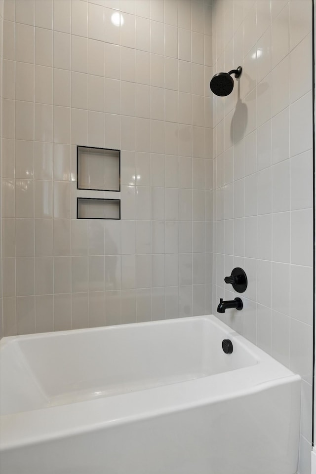 bathroom with shower / bathing tub combination