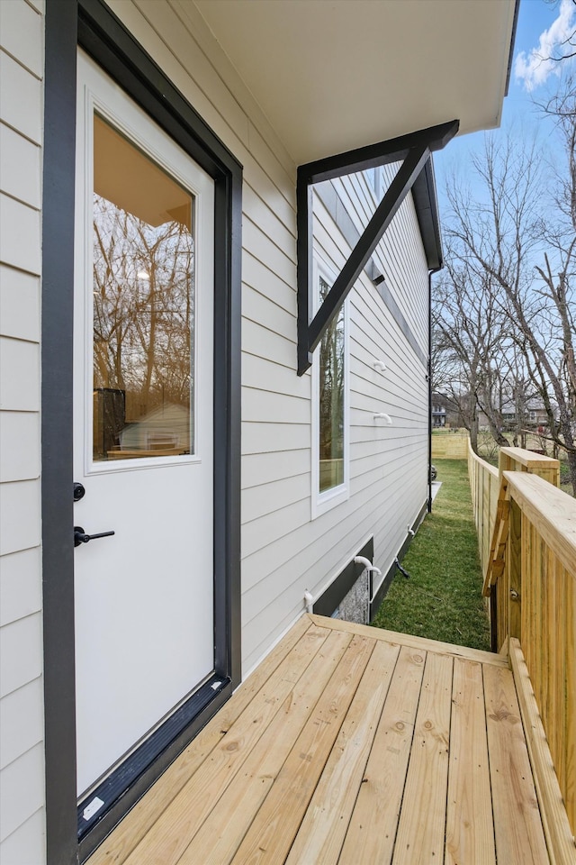 wooden deck with a yard