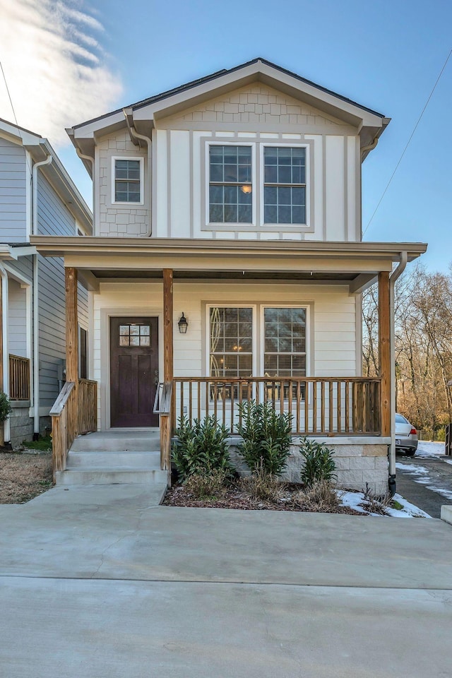 view of front of property featuring covered porch