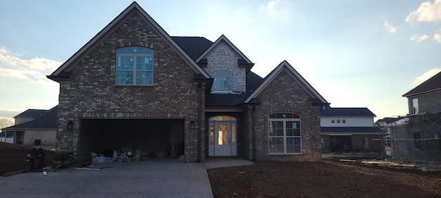 view of front of property featuring a garage