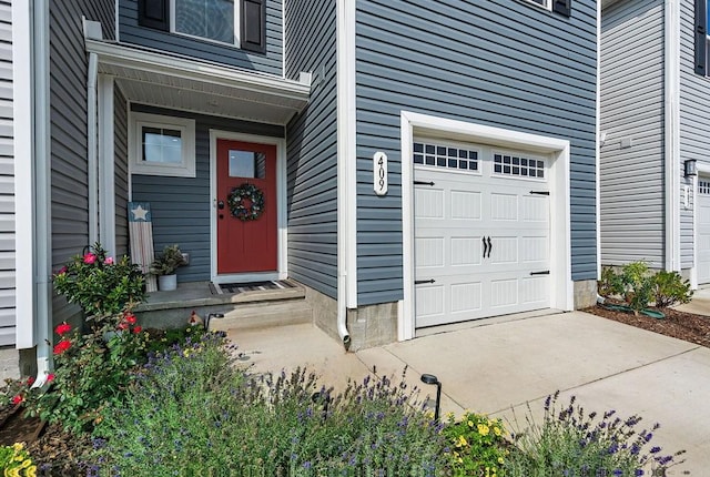 property entrance featuring a garage