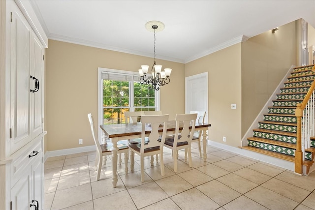 tiled dining area featuring ornamental molding and a chandelier