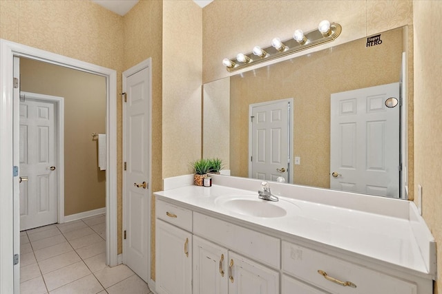 bathroom with vanity and tile patterned floors