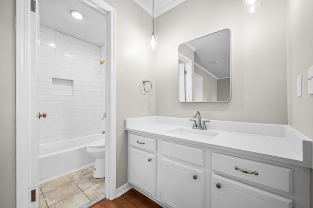 full bath with shower / bathtub combination, ornamental molding, vanity, and toilet