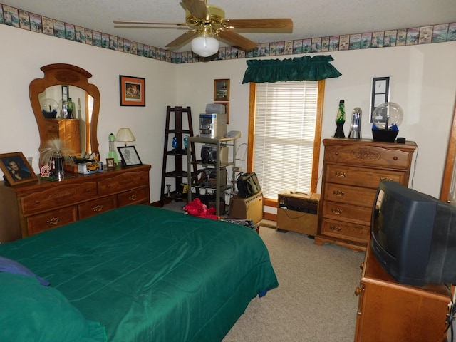 bedroom with carpet and ceiling fan