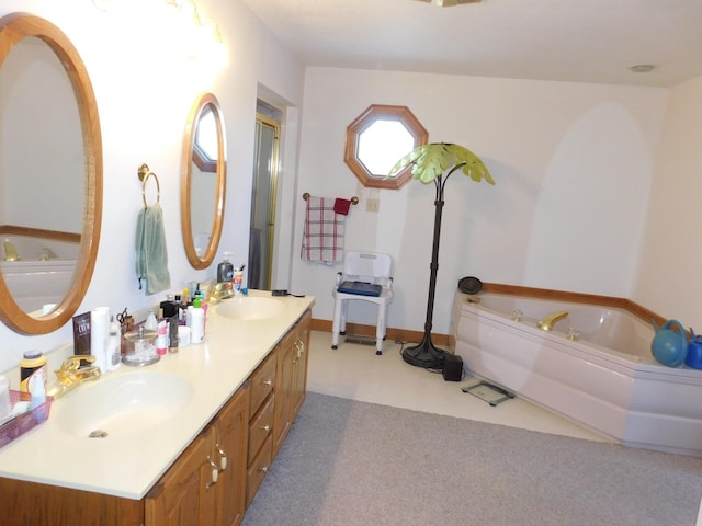 bathroom with a bathtub and vanity