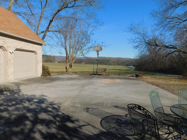 view of patio with a garage