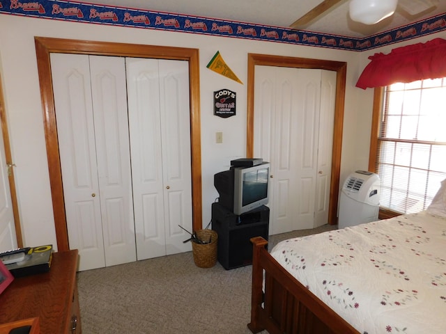 bedroom featuring ceiling fan and carpet flooring