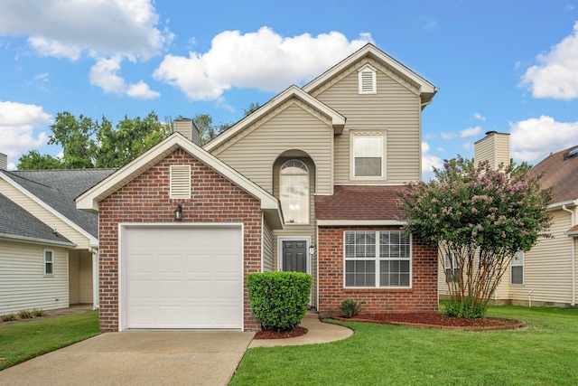 view of property with a garage and a front lawn