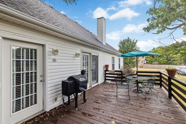 wooden deck featuring grilling area