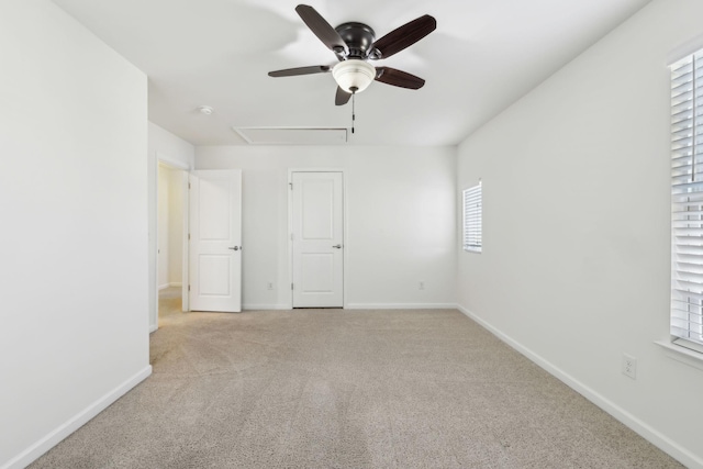 unfurnished bedroom with light carpet and ceiling fan