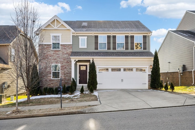 view of front of property featuring a garage