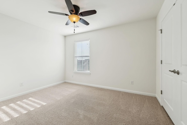 unfurnished bedroom featuring ceiling fan and carpet floors