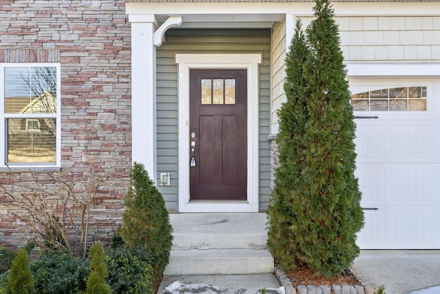 property entrance featuring a garage