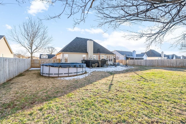 view of yard featuring a covered pool