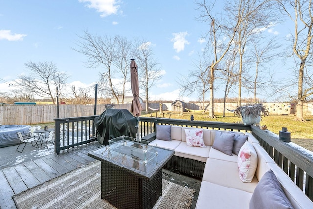 wooden terrace with grilling area and outdoor lounge area