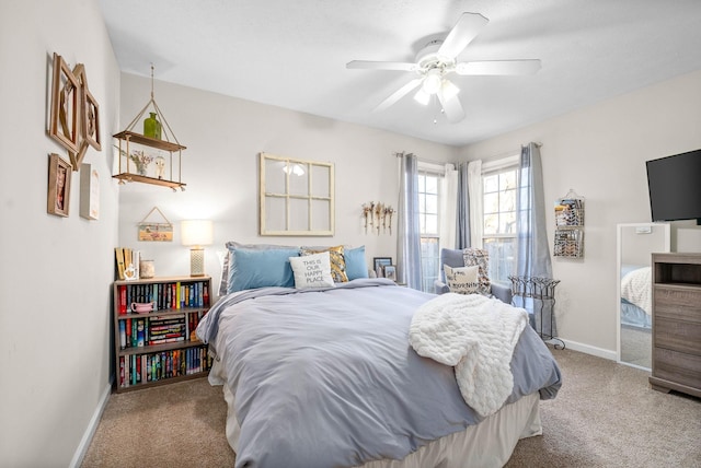 carpeted bedroom featuring ceiling fan