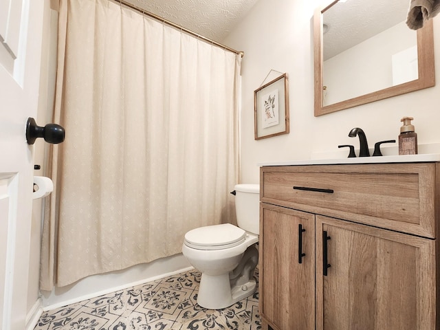 full bathroom with a textured ceiling, tile patterned flooring, vanity, toilet, and shower / bath combo with shower curtain