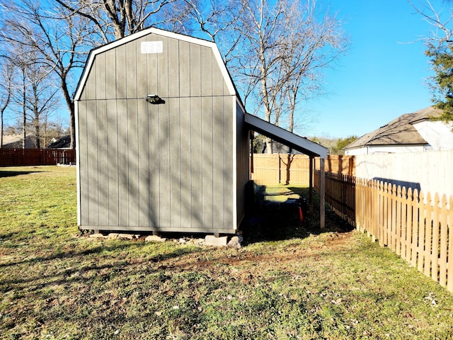 view of outbuilding featuring a yard